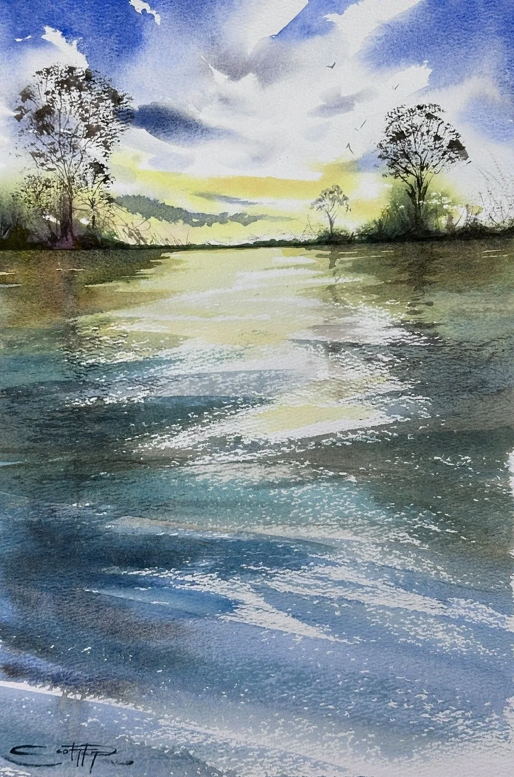 An original watercolour painting by Scott Pleydell-Pearce showing a calming landscape of sky and water reflections. The sky is bright blue with a glow of yellow near the horizon. Bare winter trees border the yellow light either side of the waters edge. Dynamic brushstrokes suggest reflections and water surface swell and wind ripples.