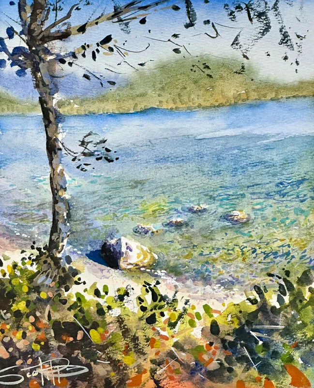 A watercolour painting in an impressionistic style showing a view  of a beach and water in blues and greens, distant trees and mountains out of focus and a singular tree in the foreground with fall coloured leaves on the ground.